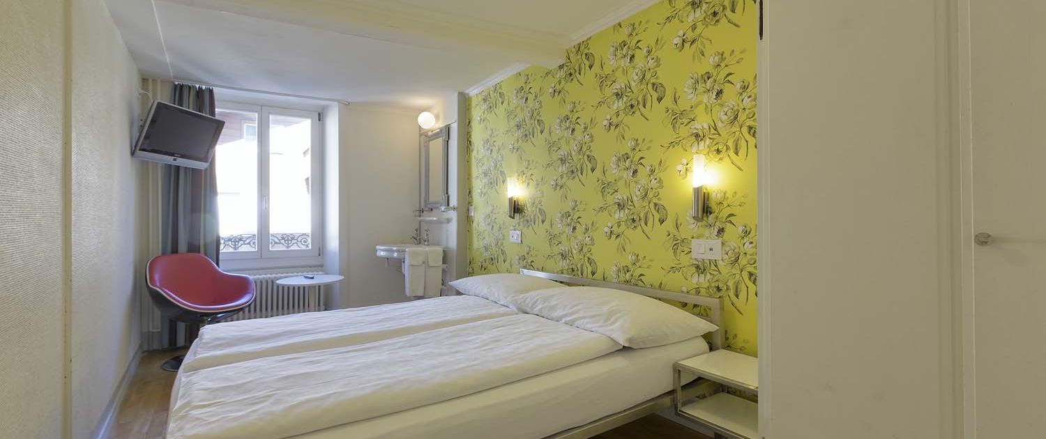 Bright double rooms at Alplodge hotel in Interlaken Switzerland