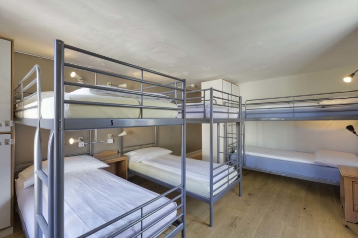 Dormitory rooms at Alplodge Hostel in the heart of Interlaken Switzerland
